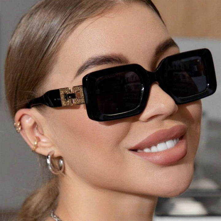 Women's fashionable sunglasses in elegant square design with luxurious gold details Skanto