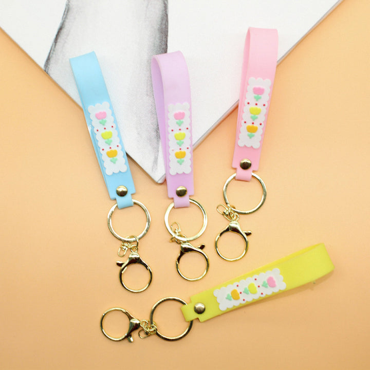 Unisex nøkkelring laget av slitesterk silikon med leken design Skanto