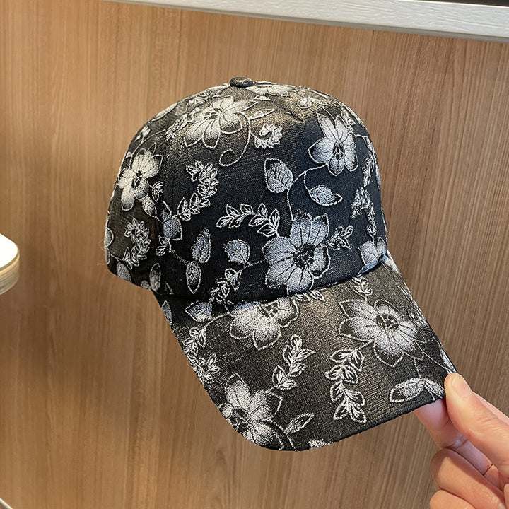 Kvinnens blomsterbroderte baseballcap Skanto