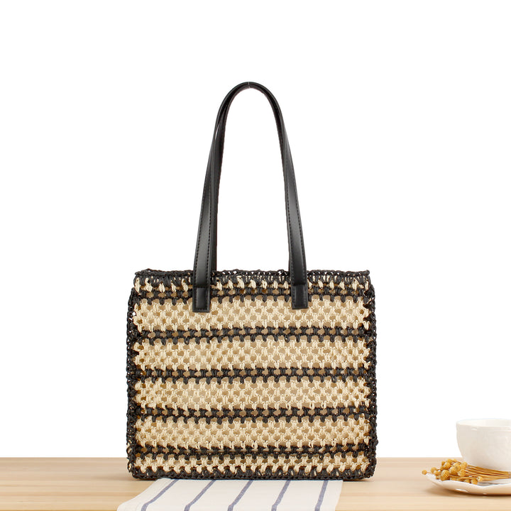 Handbag with durable braided design and elegant leather handles Skanto