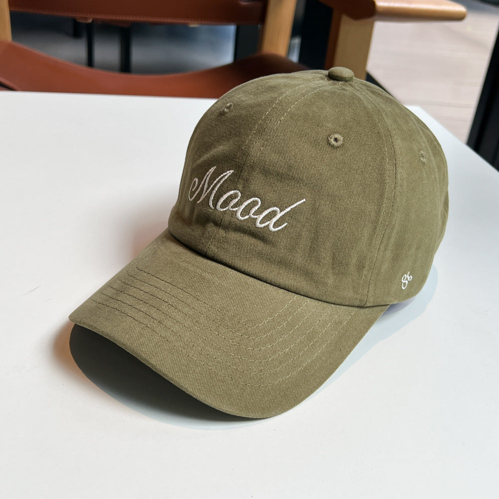 Kvinnenes broderte statement caps Skanto