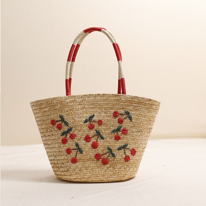 Handmade basket bag with vibrant floral embroidery design Skanto