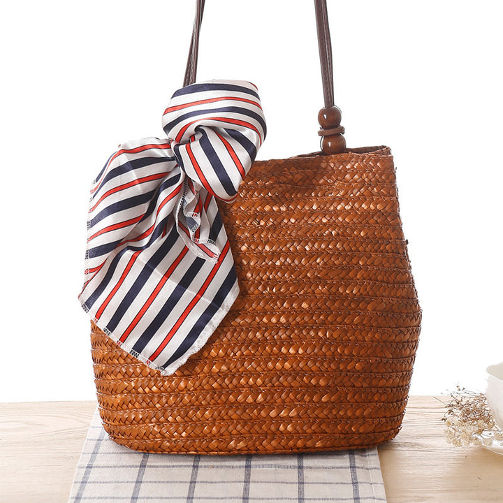 Elegant basket bag with stylish ribbon detail Skanto