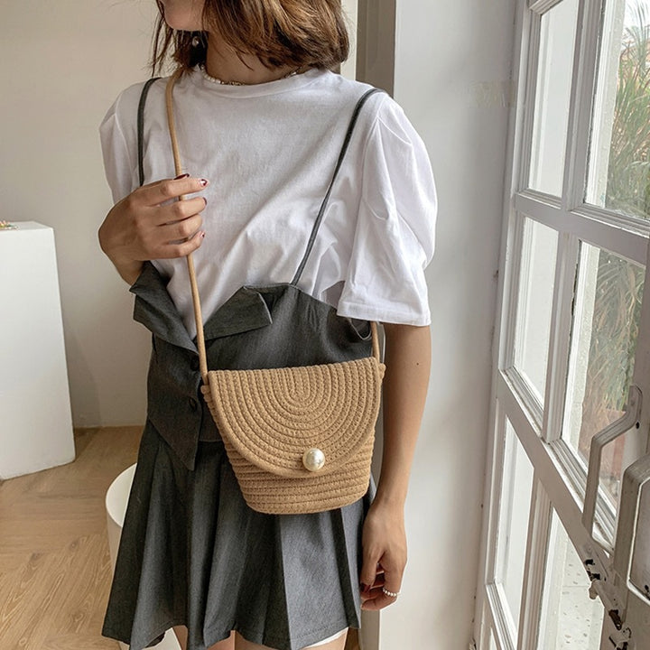 Dame Stilfull Clutch laget av flettet materiale Skanto