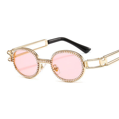 Dame moteriktig solbrille med glamorøs ramme Skanto