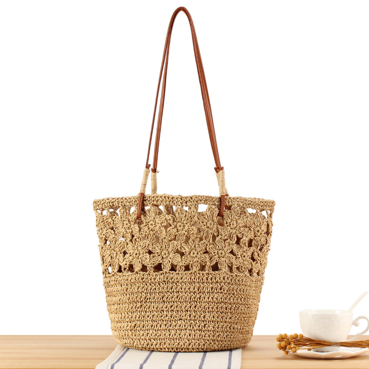 Hand-knotted beach bag with floral details Skanto