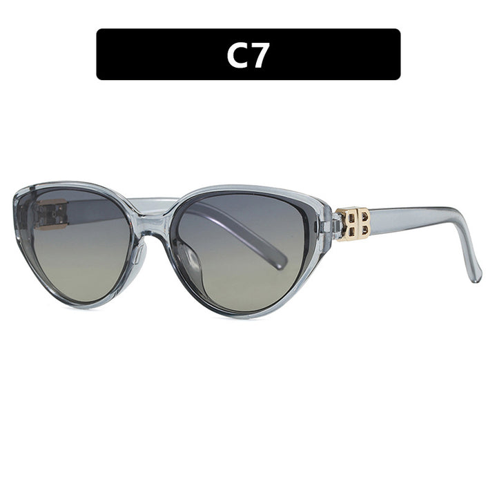 Dame modische Cat-Eye solbriller med elegant metallramme og UV-beskyttelse Skanto