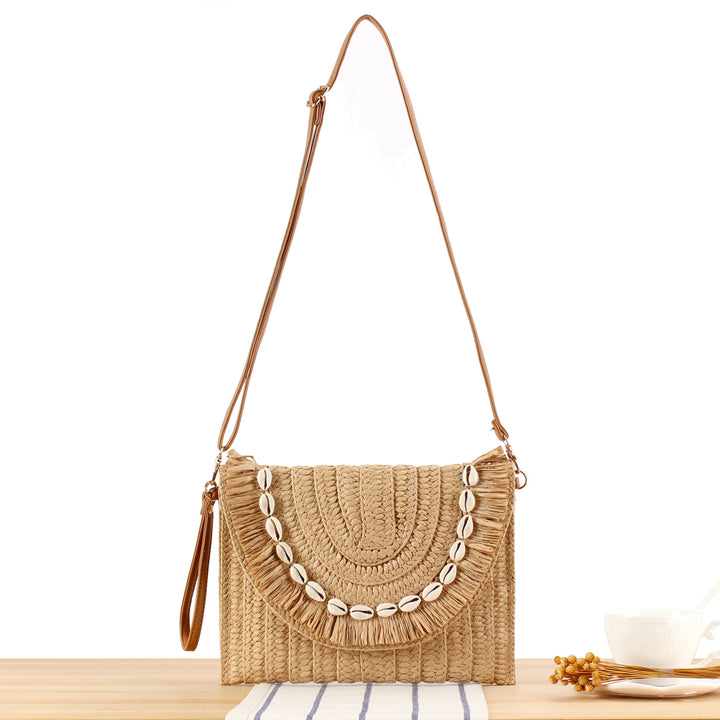 Shoulder bag with hand-knotted shell decor Skanto