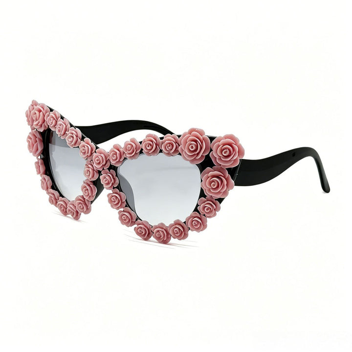 Damen hjerteformet solbrille med blomsterapplikasjon Skanto