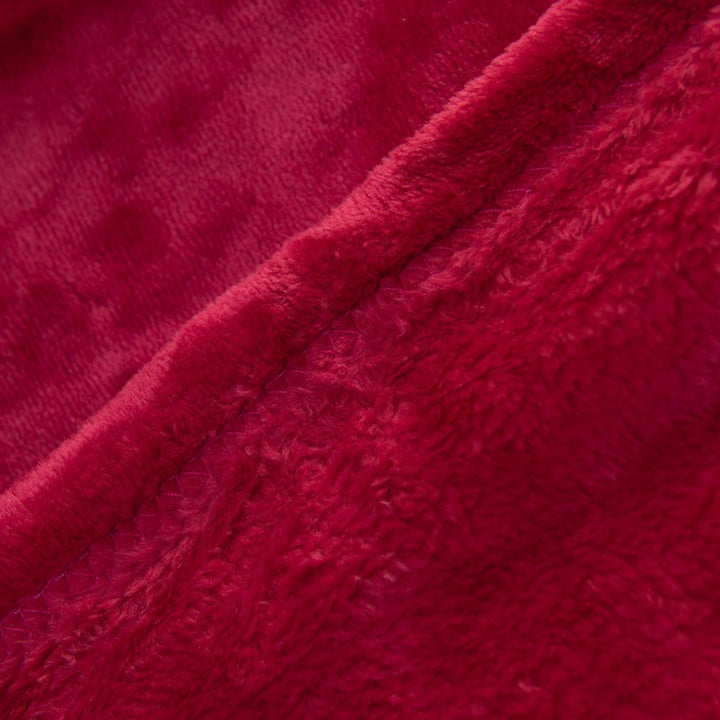Damer luksuriøs kosepledd laget av høykvalitets mikrofiber Skanto