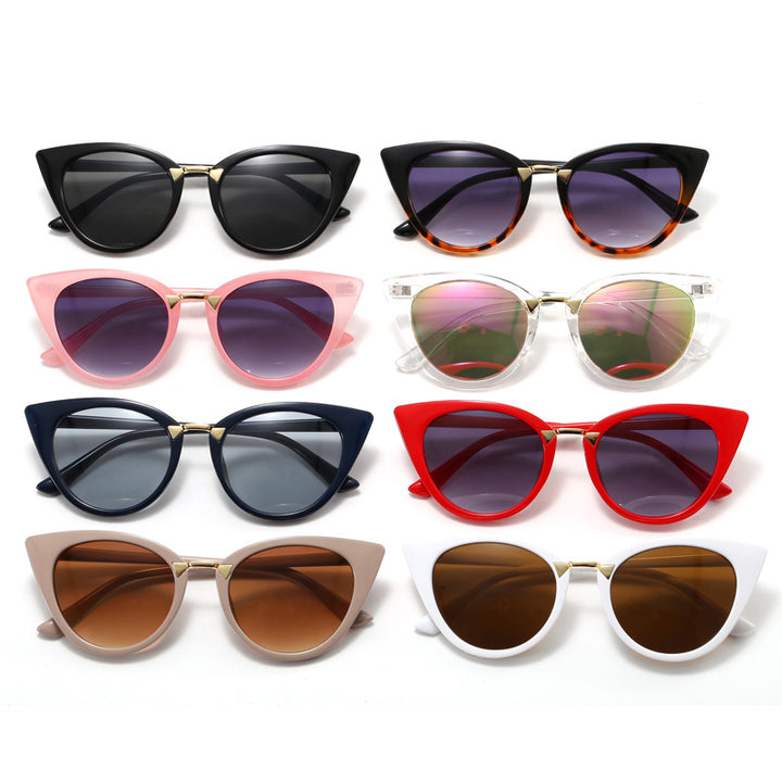 Dame Cat-Eye solbrille med elegant gull detaljer Skanto