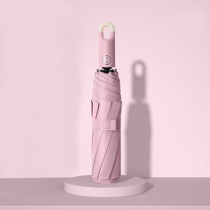 Dame elegant foldes regnparaply med ergonomisk håndtak og UV-beskyttelse Skanto