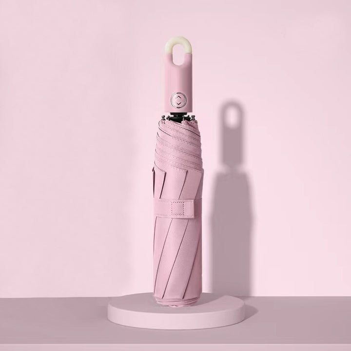 Dame elegant foldes regnparaply med ergonomisk håndtak og UV-beskyttelse Skanto