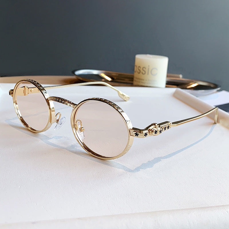 Dame Elegant solbrille med filigran detaljer Skanto