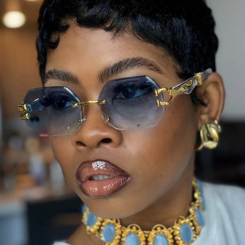 Women's fashionable sunglasses with extravagant octagonal design and gold accents Skanto
