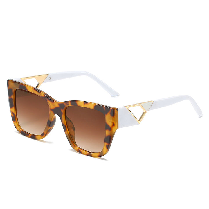 Dame Oversized Solbriller med moderne geometrisk design og elegant metallaccent Skanto