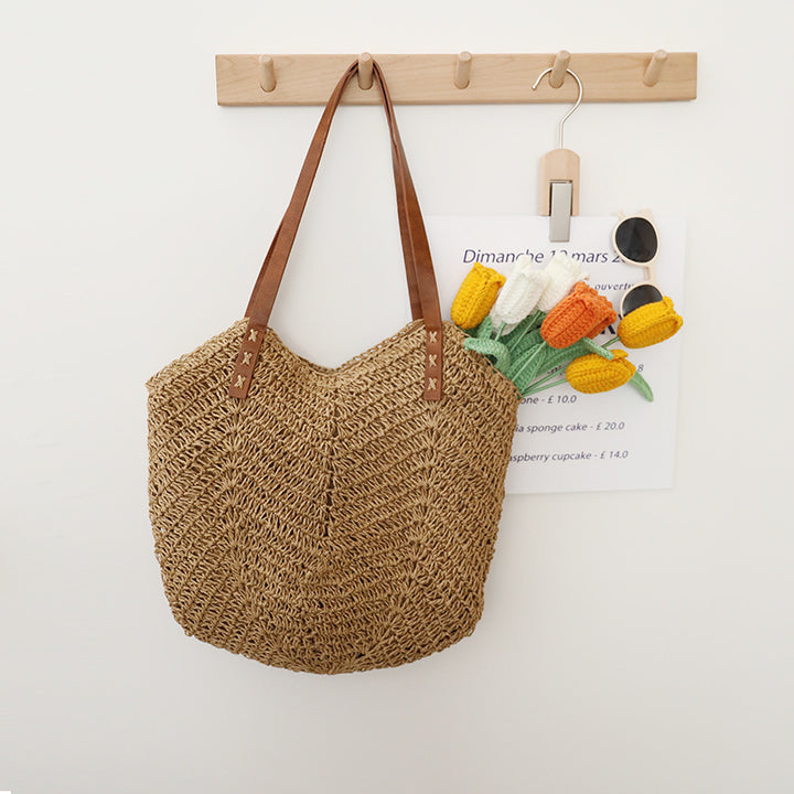Braided basket bag with sturdy leather handles Skanto