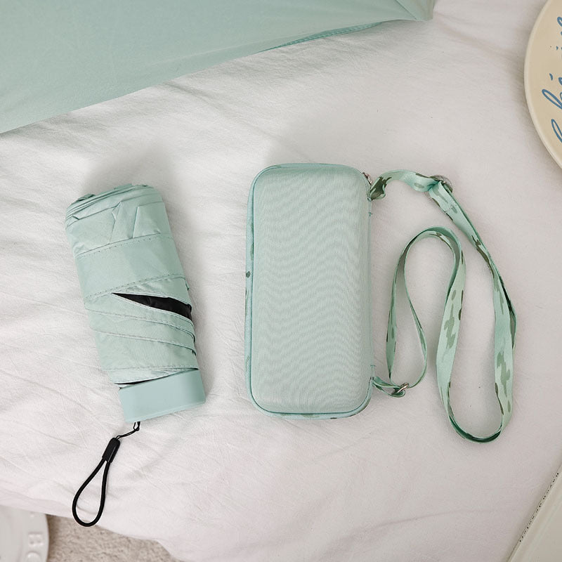 Damer kompakt og elegant sammenleggbar paraply med bæreveske Skanto