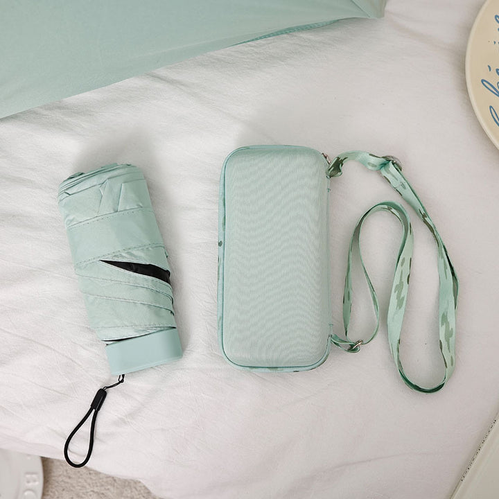 Damer kompakt og elegant sammenleggbar paraply med bæreveske Skanto