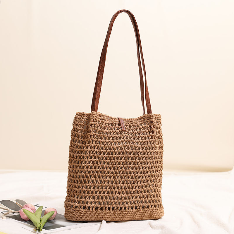 Hand-knotted basket bag with elegant leather handle Skanto