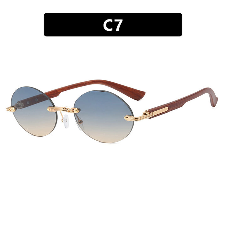 Dame rund solbrille med elegant treinnramme og UV-beskyttelse Skanto