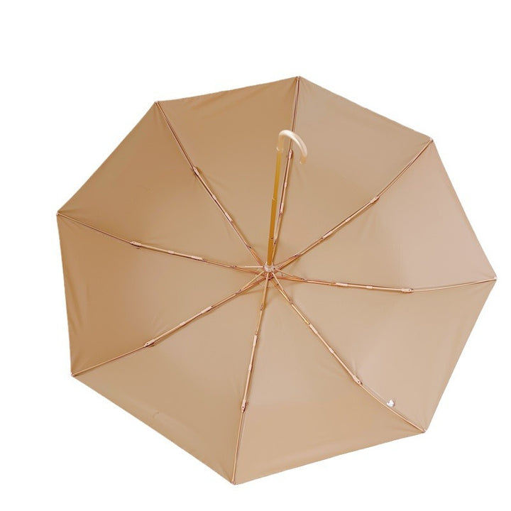 Dame sammenleggbart paraply med elegant hjerte-design Skanto