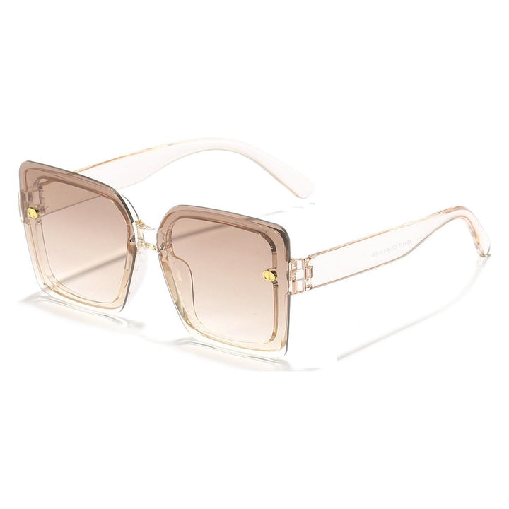 Dame moteriktig solbrille med kvadratisk design og høykvalitets ramme Skanto