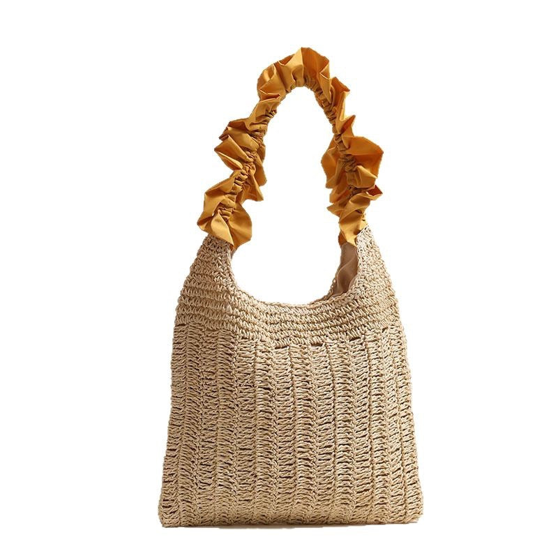 Elegant handbag with ruched decorative handle Skanto