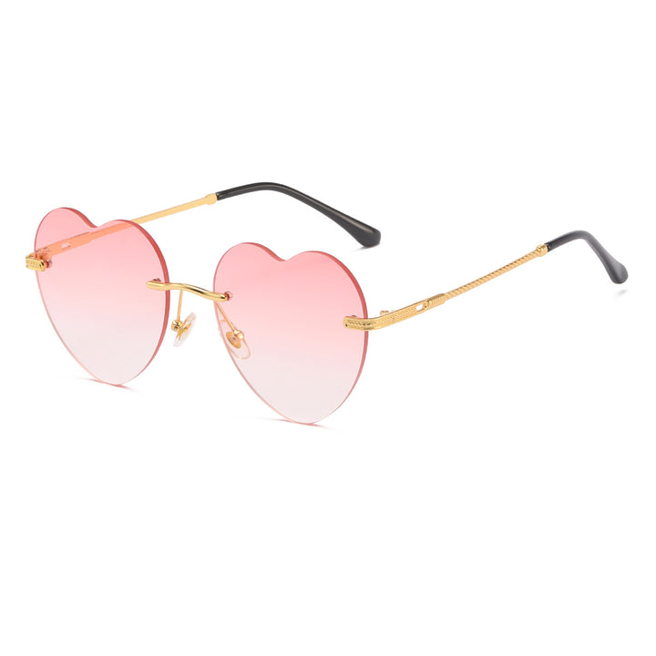 Dame hjerteformet solbrille med speilglass og gullramme Skanto