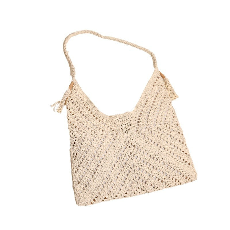 Handmade macrame shoulder bag with playful tassels Skanto