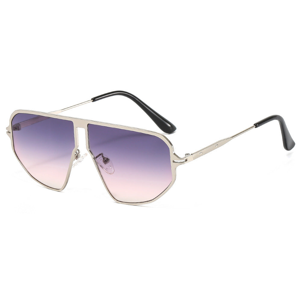 Dame iøynefallende solbriller i heksagonal design Skanto