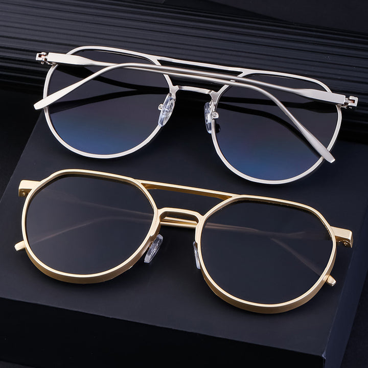 Dame moterik solbrille i stilfullt rundt design Skanto