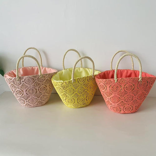 Kurvveske med elegant, flettet design Skanto