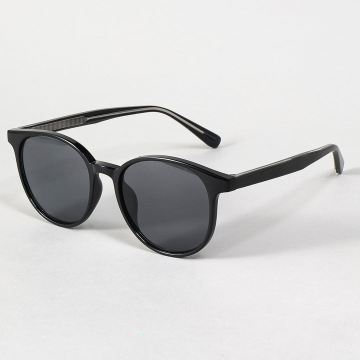 Dame moterik solbrille i elegant, rund design med UV-beskyttelse Skanto