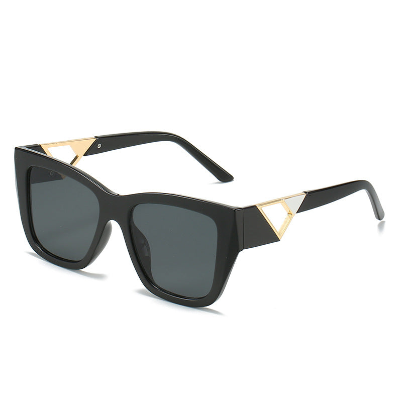 Dame Oversized Solbriller med moderne geometrisk design og elegant metallaccent Skanto