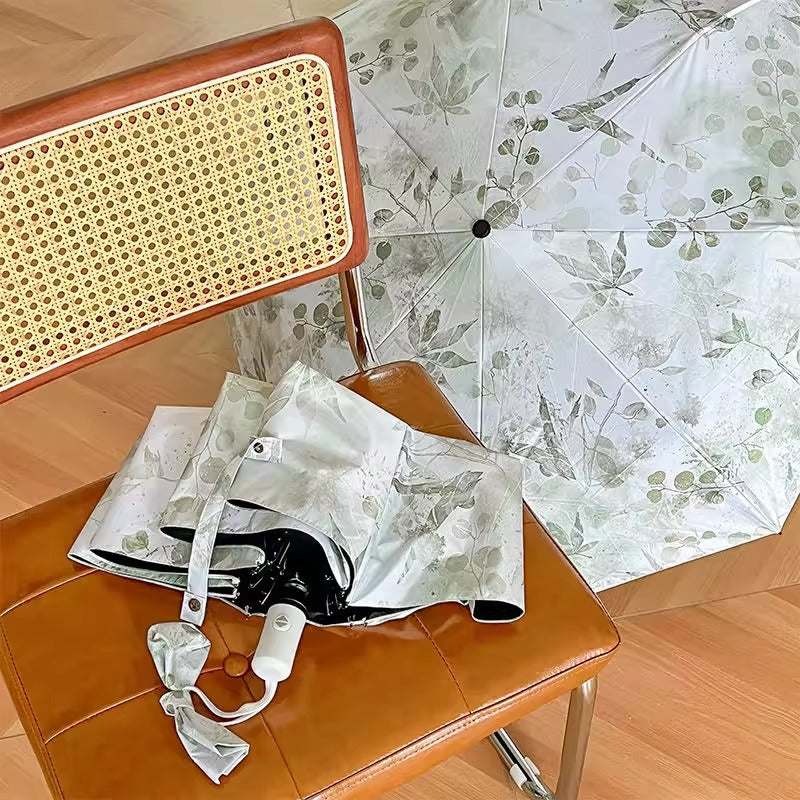 Damer Faltparaply med botanisk trykkdesign Skanto
