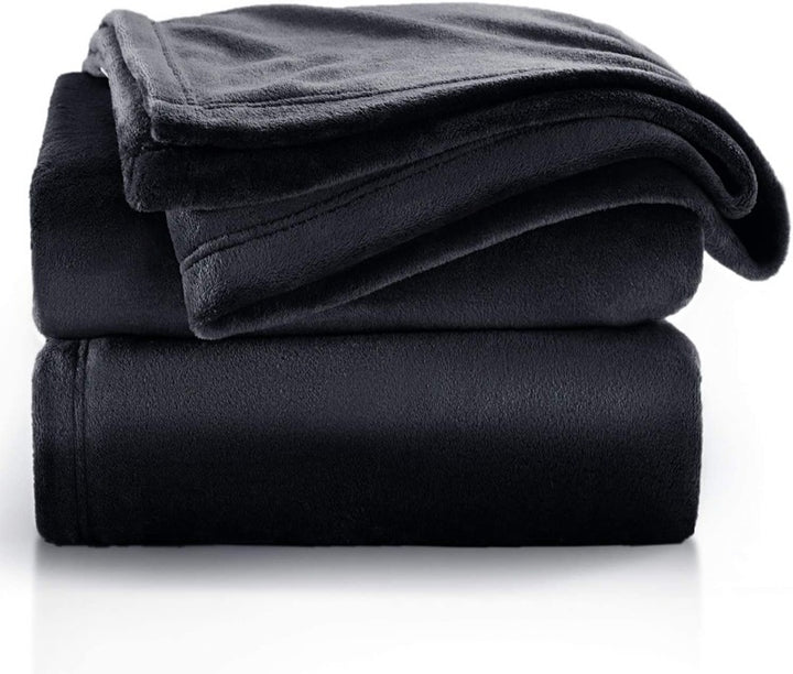 Damer luksuriøs kosepledd laget av høykvalitets mikrofiber Skanto