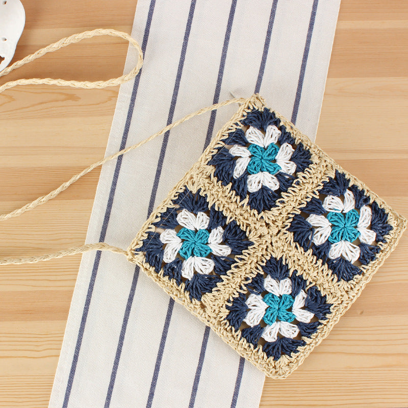 Hand-knotted shoulder bag in floral design Skanto