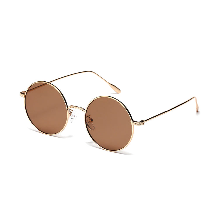Dame rund moteriktig solbrille med glamorøs ramme Skanto