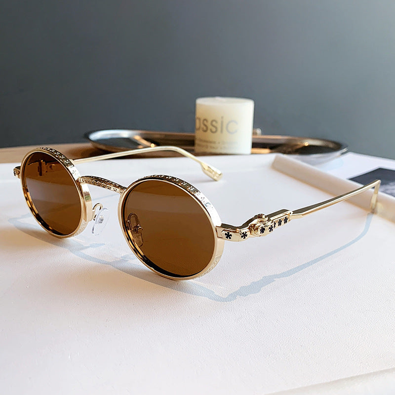 Dame Elegant solbrille med filigran detaljer Skanto