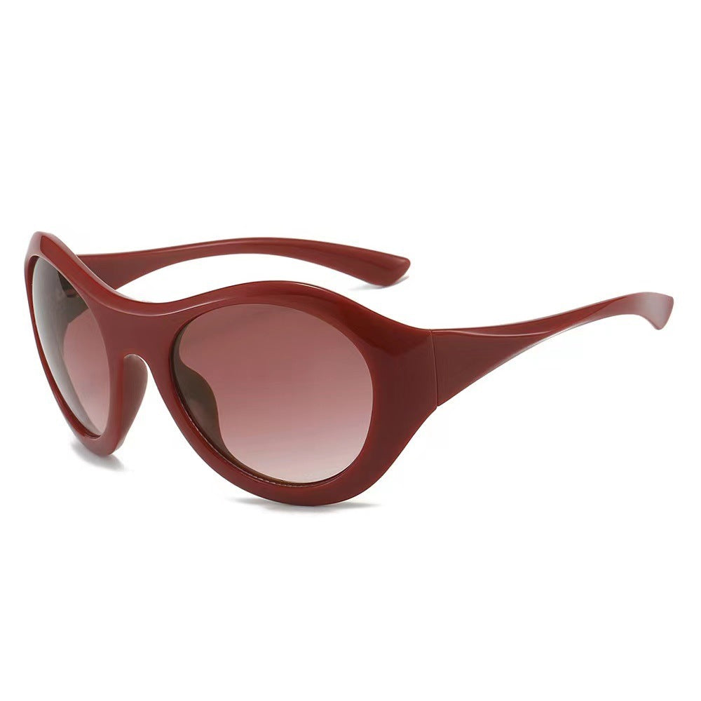 Dame Mote Oval Solbrille med gjennomsiktig ramme Skanto