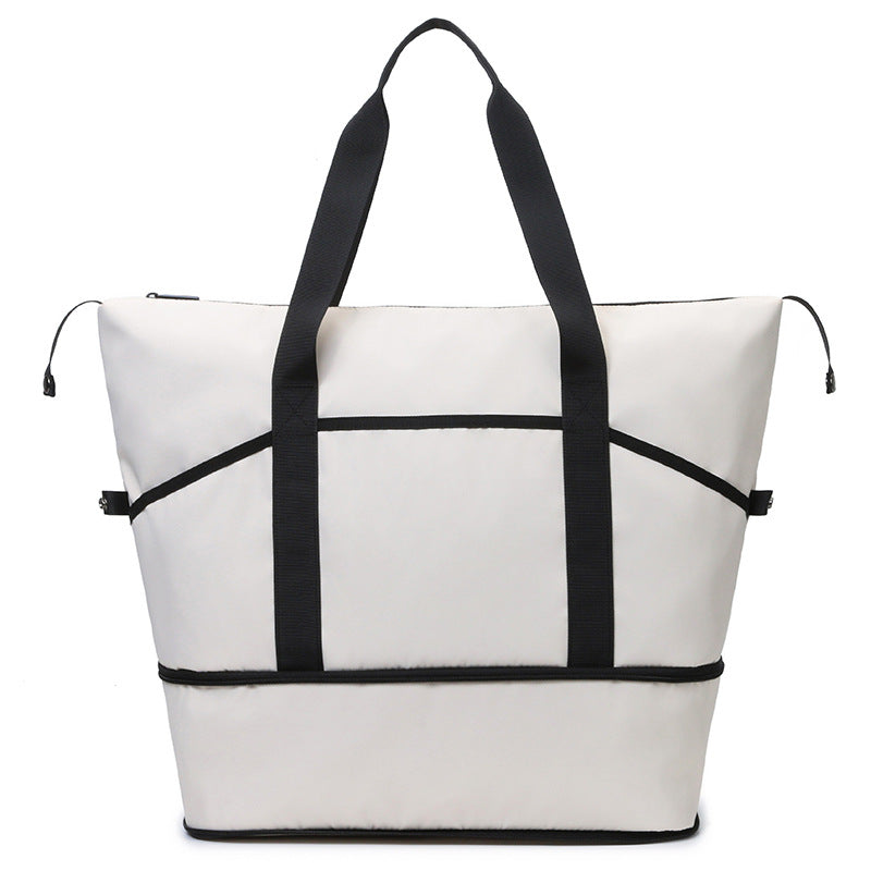 Romslig og funksjonell handlebag Skanto