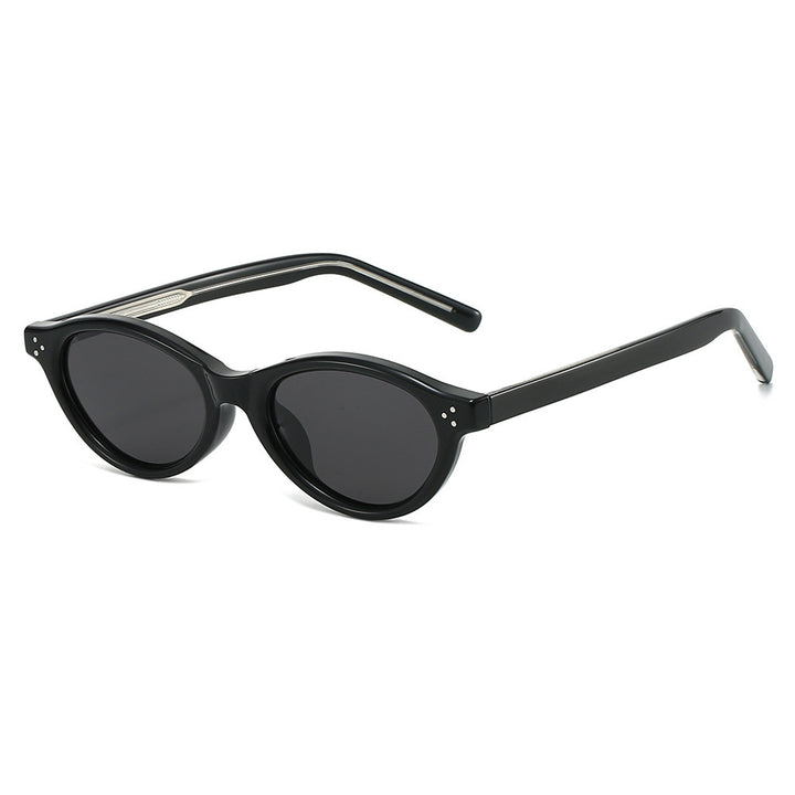 Dame Cat-Eye solbriller med elegant, transparent ramme og UV400-beskyttelse Skanto
