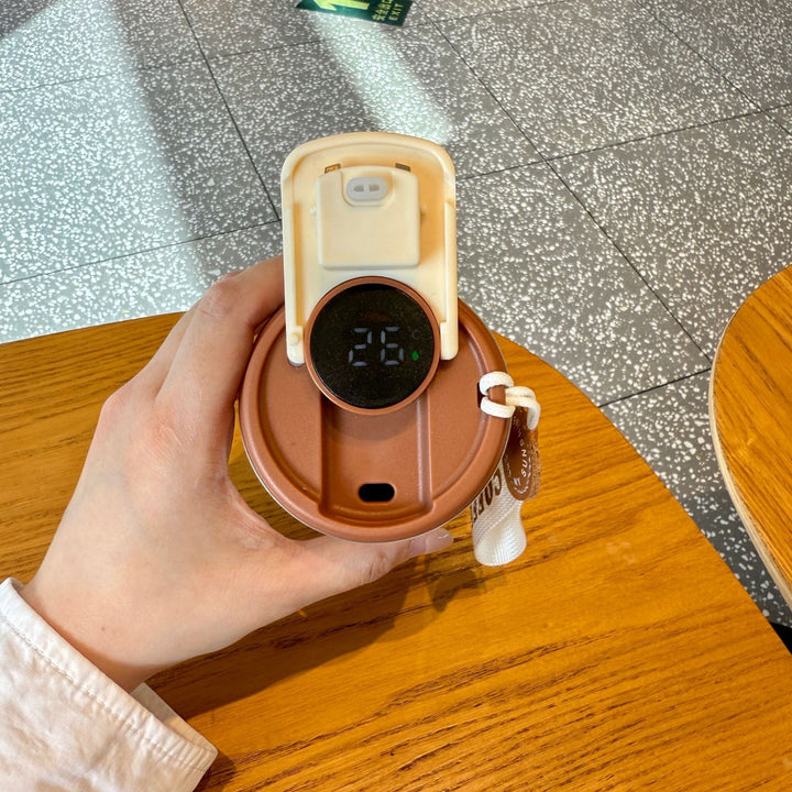 Dame isolert kaffekopp med praktisk håndholdtsløyfe Skanto
