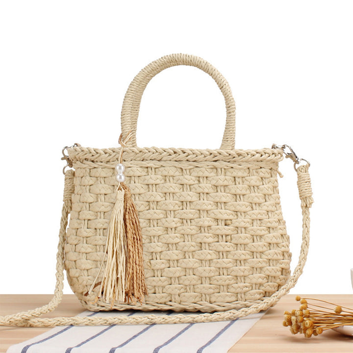 Handbag made of woven natural material with fashionable fringes Skanto