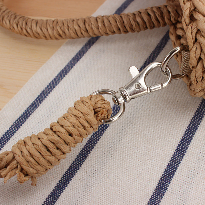 Handbag made of woven natural material with fashionable fringes Skanto
