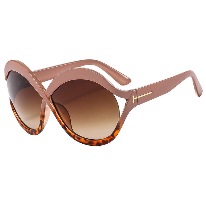 Dame ekstravagant formet solbrille Skanto