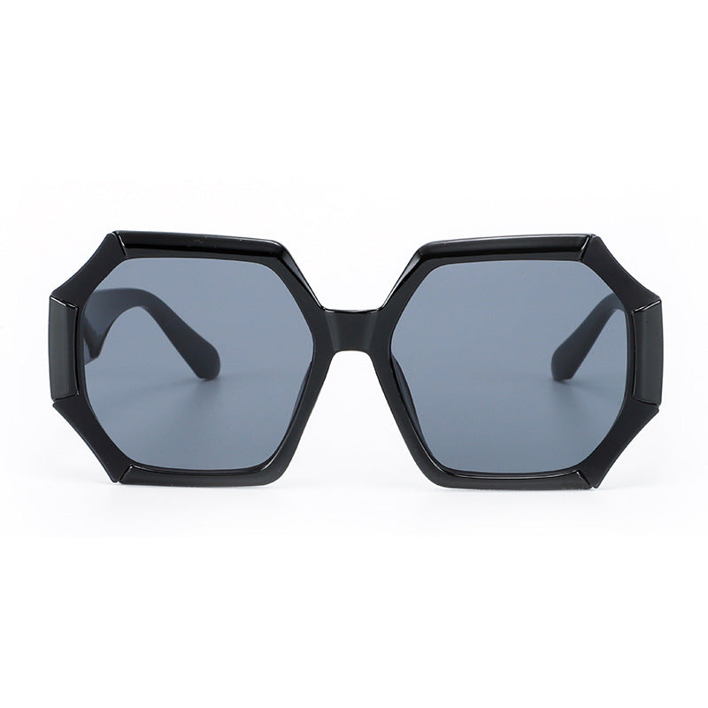 Dame moterelatert solbrille med fasettert ramme Skanto