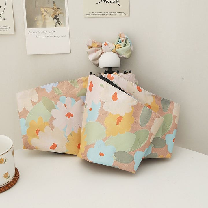 Dame sammenleggbar paraply med kreativt blomsterdesign og automatisk åpningsmekanisme Skanto