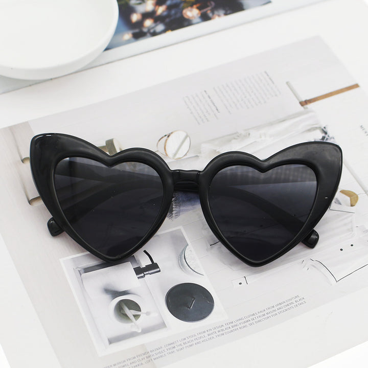Dame hjerteformet solbrille med glitrende ramme Skanto